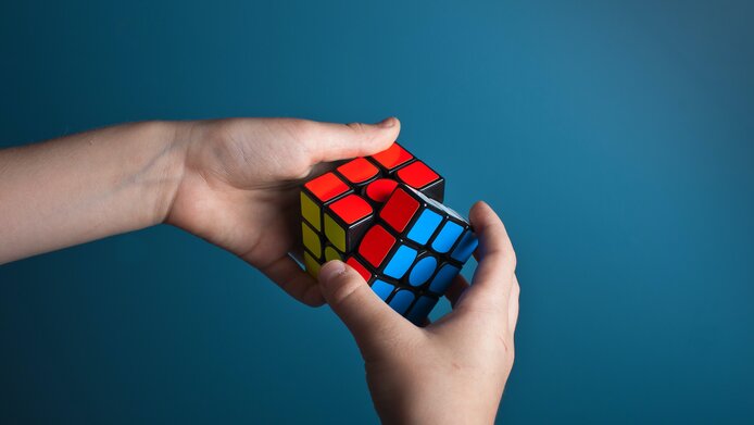 Man solves Rubik's cube
