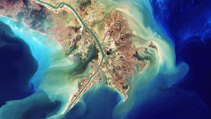 Satellite image of the mouth of the Mississippi River showing sediments discolored by phosphorus and nitrogen