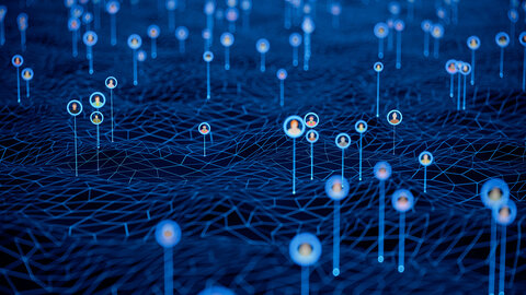 Personen als Nadelköpfe hellblauer Pins, die auf einer dunkelblauen Gitternetzstruktur verteilt sind
