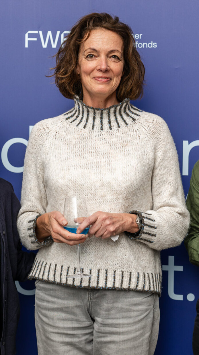 Teilnehmerinnen vor der FWF-Fotowand