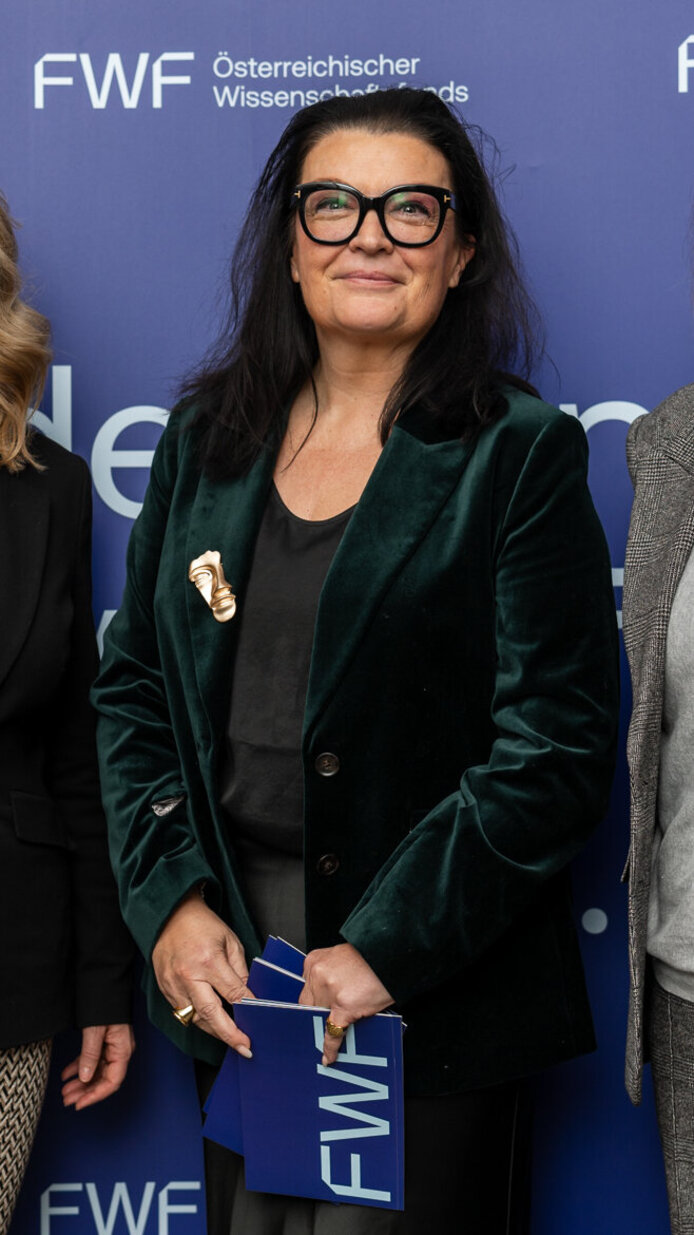 Teilnehmerinnen vor der FWF-Fotowand