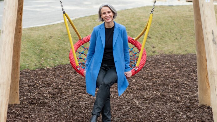 Ulrike Zartler on a swing