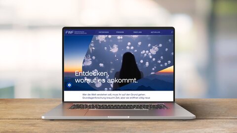 Fullscreen-Ansicht der FWF-Website auf einem Laptop