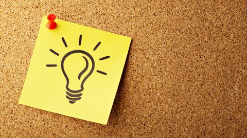 Notizpapier mit Glühbirne